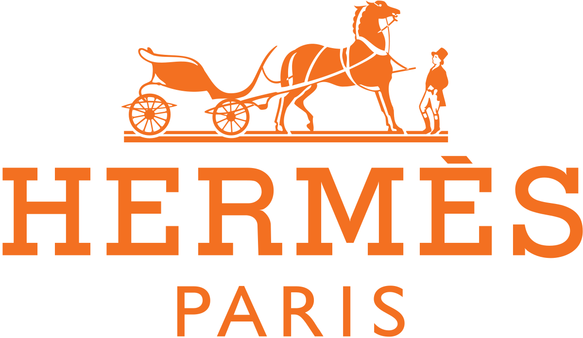 Custom branded sparkle lollipops featuring the Hermes logo, created for luxury corporate events and designer promotional gifts by Sweet Caroline Confections.