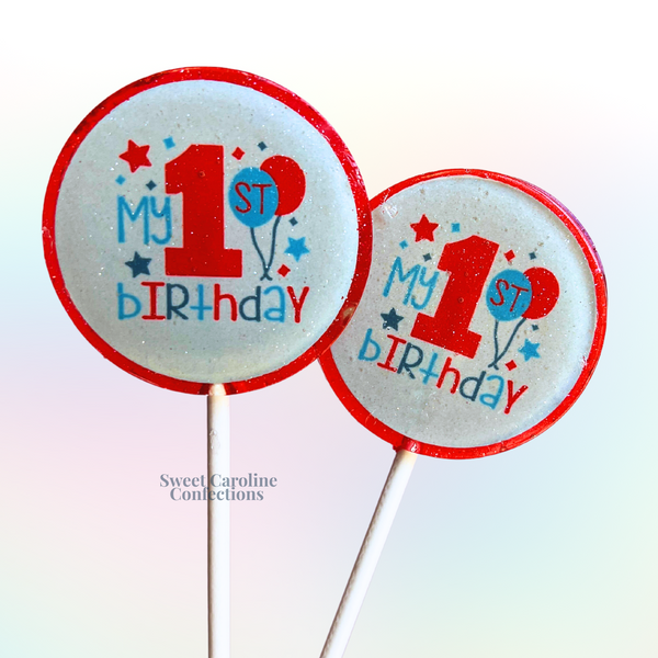 Celebration lollipops for a 1st birthday featuring a "My 1st Birthday" balloon design in red and light blue with festive glitter.