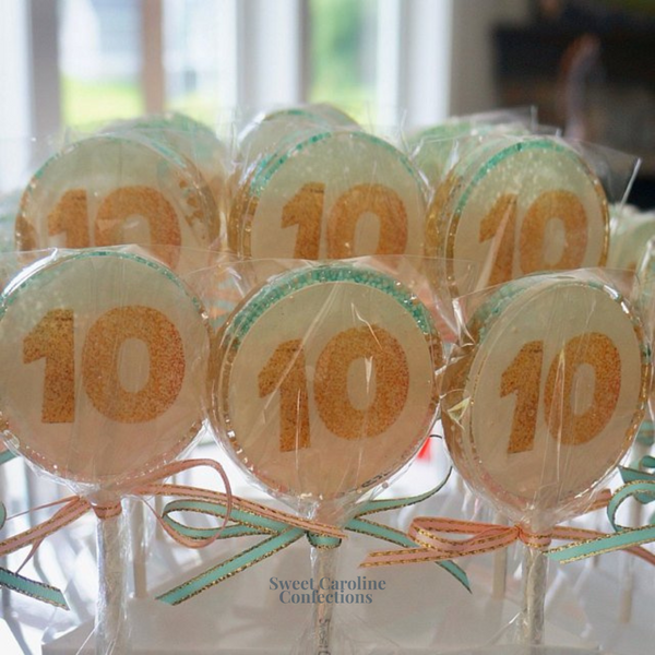 00365 EDIBLE WITH OMBRE AQUA, GOLD AND LIGHT PINK IN THE BACK - Sweet Caroline Confections | The Original Sparkle Lollipops