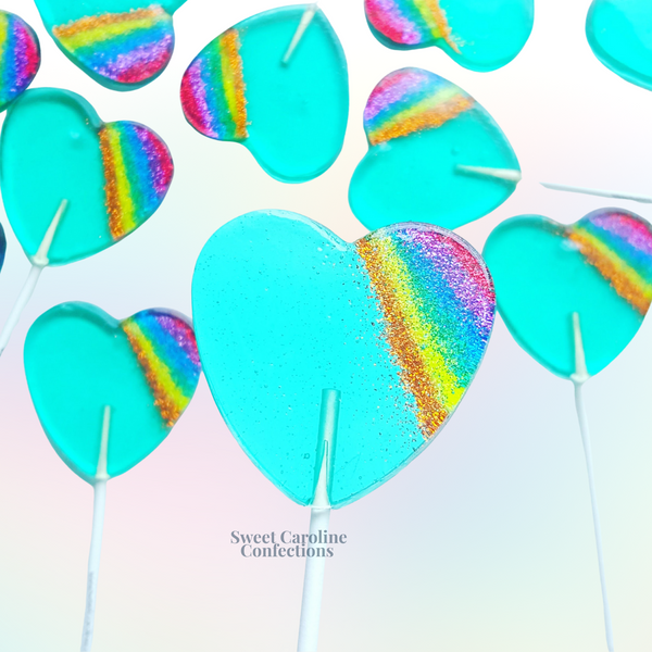 Aqua rainbow sparkle lollipops with vibrant colors and glitter.