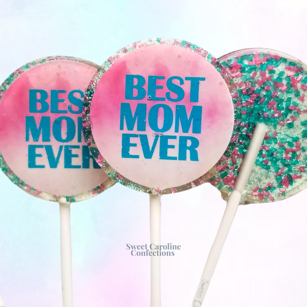 'Best Mom Ever' custom lollipops in champagne flavor with gold sparkle for Mother's Day.