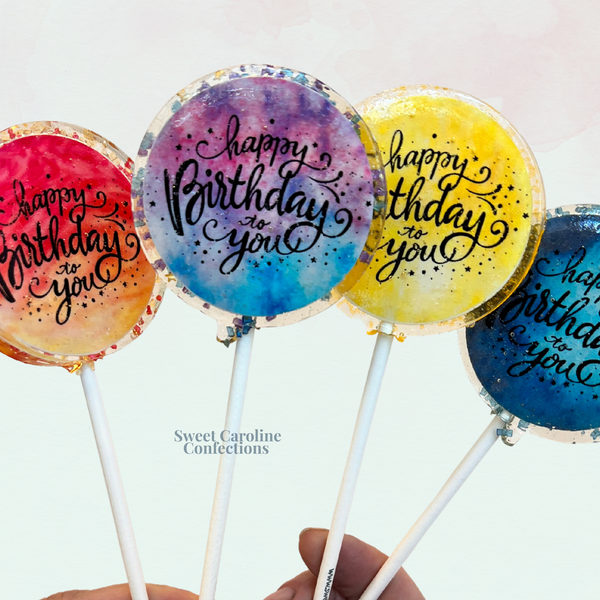 Birthday cake flavored lollipops with a colorful "Happy Birthday To You" design and multi-colored sparkles.