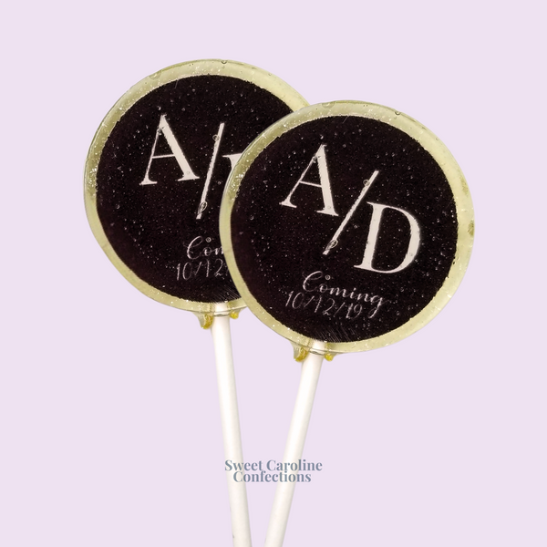 Elegant black and white sparkle lollipops for formal wedding favors.