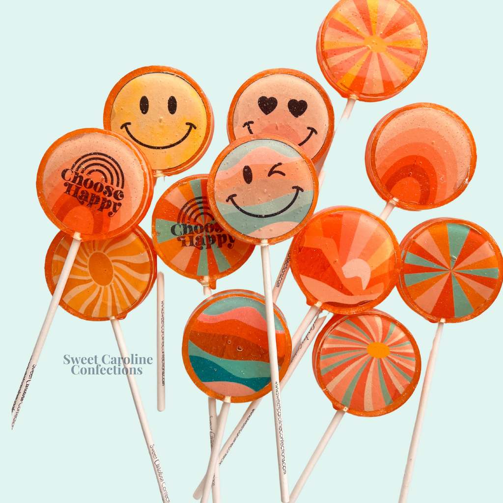 Peach flavored gold sparkle lollipops from the Choose Happy collection.