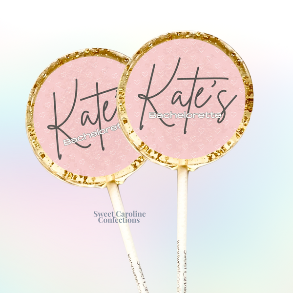 Personalized bachelorette lollipops with custom names and gold glitter.