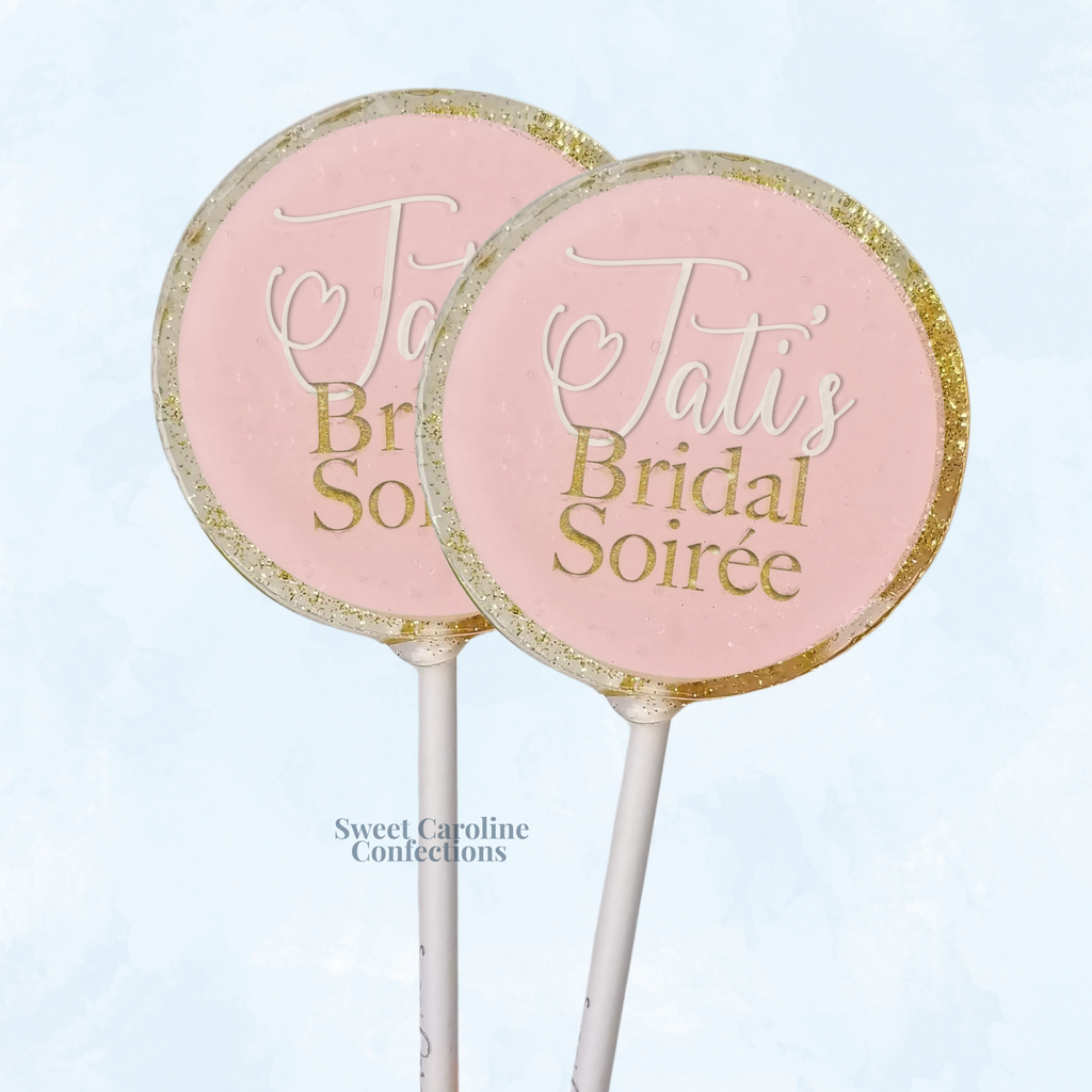 Custom Bridal Soiree lollipops with elegant fonts and gold edible glitter.