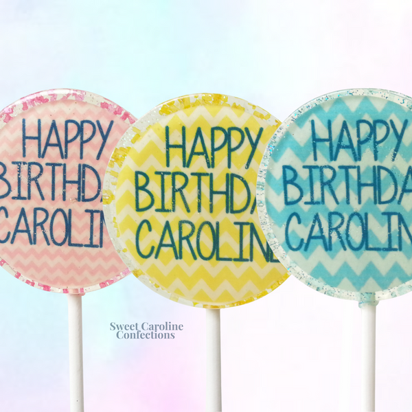 Customizable chevron pattern lollipops with "Happy Birthday" text and gold glitter, tailored for personalized birthday party favors.