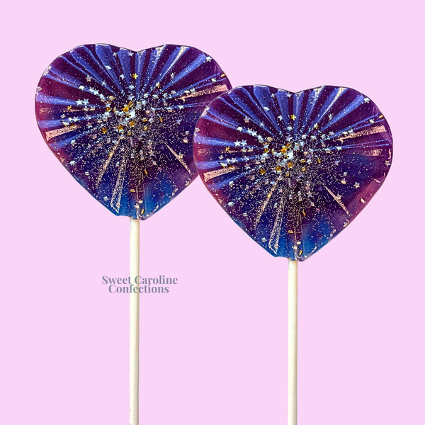Faceted heart shaped ombre lollipops in tropical punch flavor