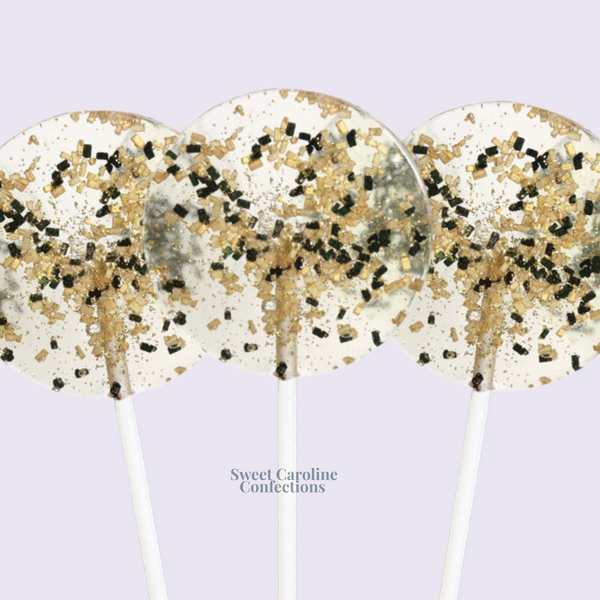 Elegant gold and black sparkle candy for sophisticated New Year's celebrations by Sweet Caroline Confections.
