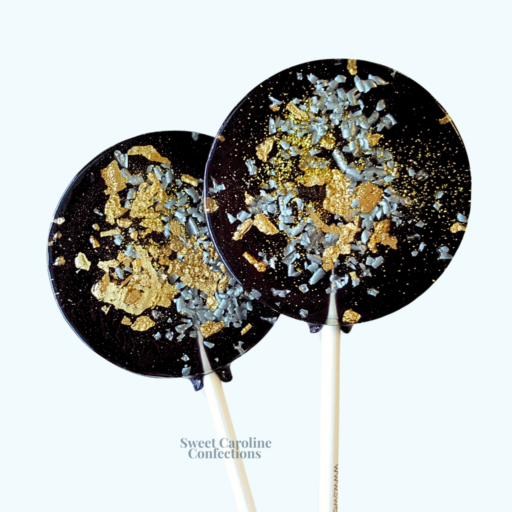 Sophisticated black lollipops with gold and silver sparkle