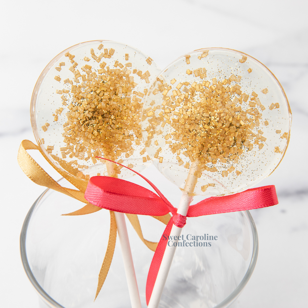 Clear lollipops with elegant gold sparkle and glitter