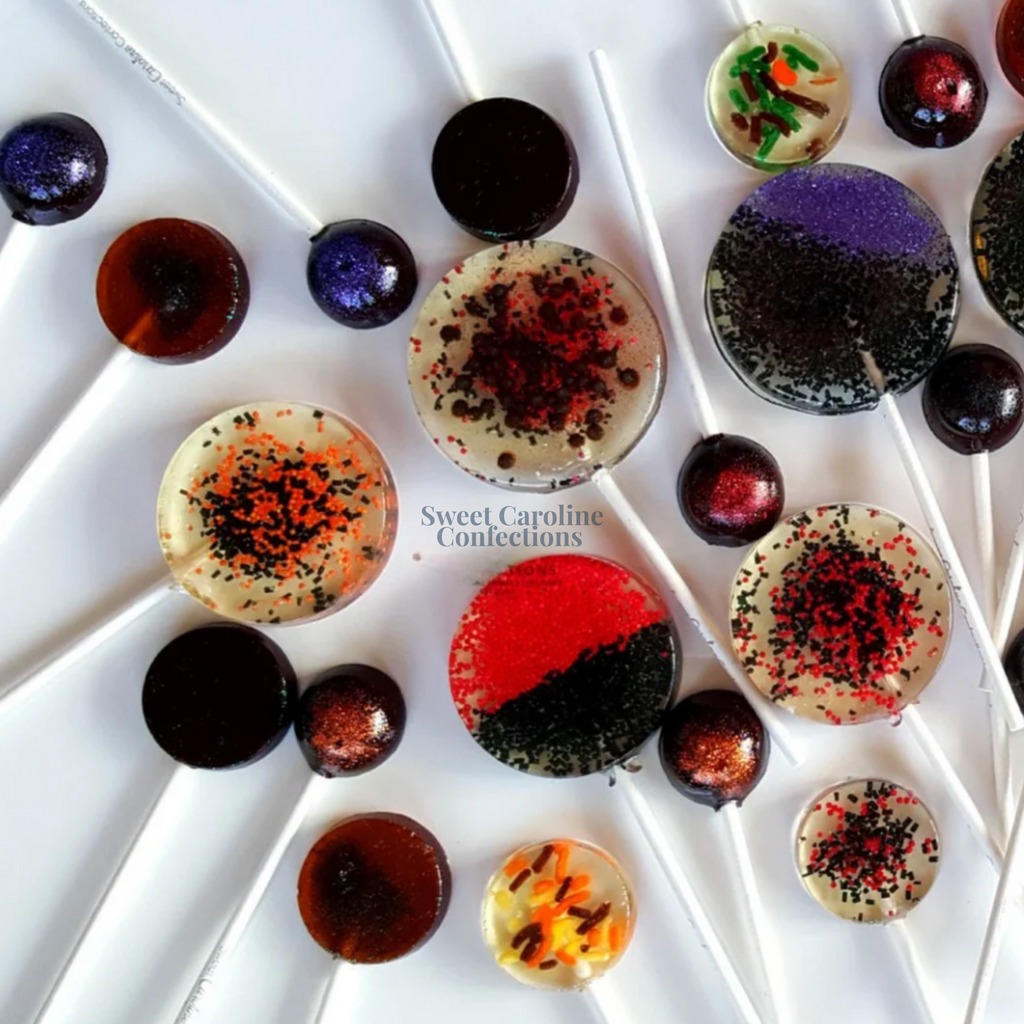 Halloween variety pack of assorted sparkle lollipops in spooky designs, flavors, and sizes from Sweet Caroline Confections.

