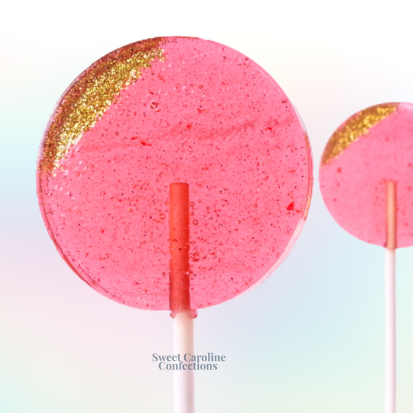 Hot pink and gold sparkle lollipops with edible glitter