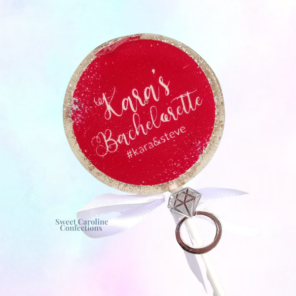 Hot pink and white custom bachelorette lollipops with personalized text.