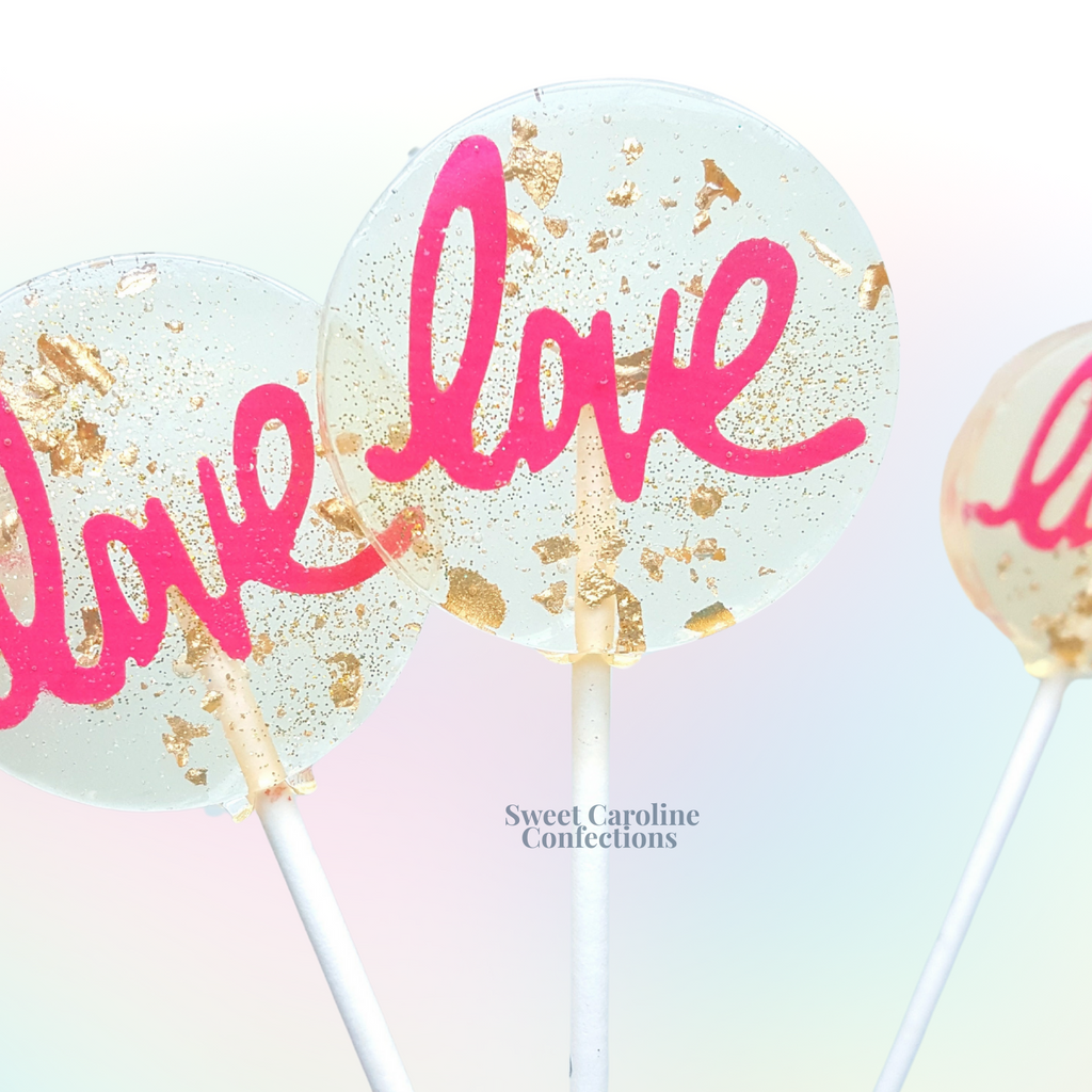 Hot pink lollipops with gold 