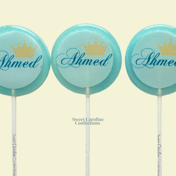 Regal light blue and gold lollipops featuring a gold crown and customizable name, ideal for a "Little Prince" themed birthday.