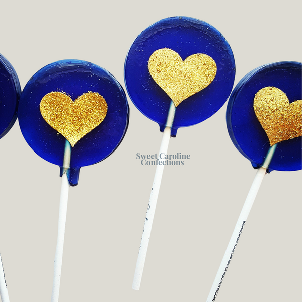 Navy blue and gold heart shaped sparkle lollipops