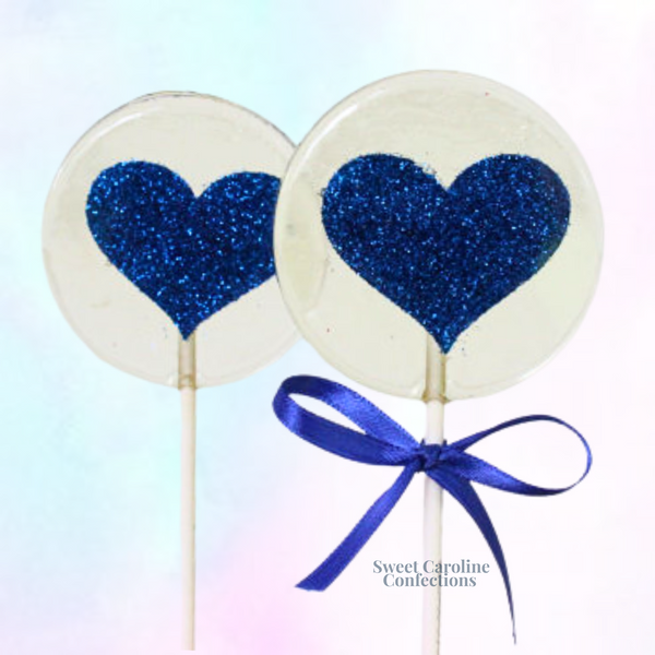 Navy blue heart shaped sparkle lollipops