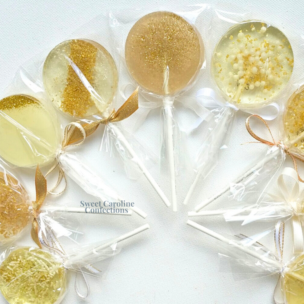 Nude collection wedding lollipops in gold white and cream