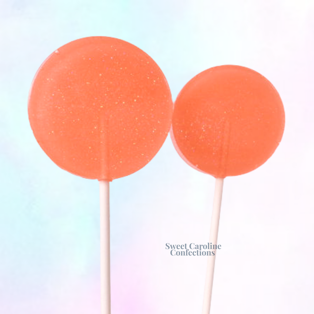 Soft peach colored lollipops with matching peach glitter
