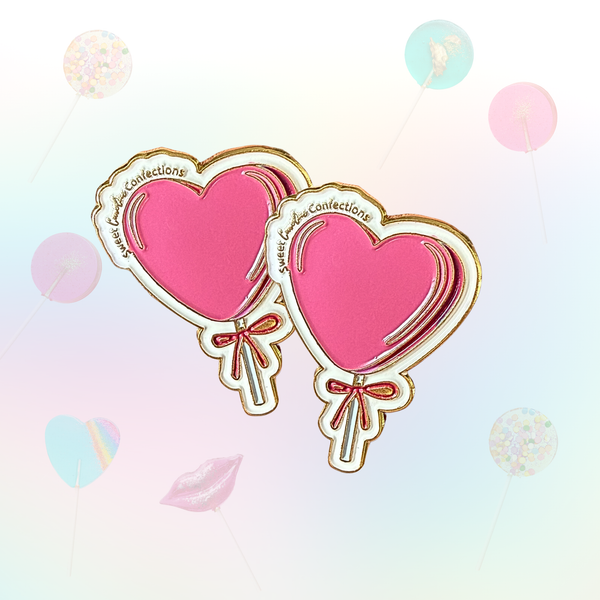 1 inch pink heart-shaped sparkle lollipop enamel pin.