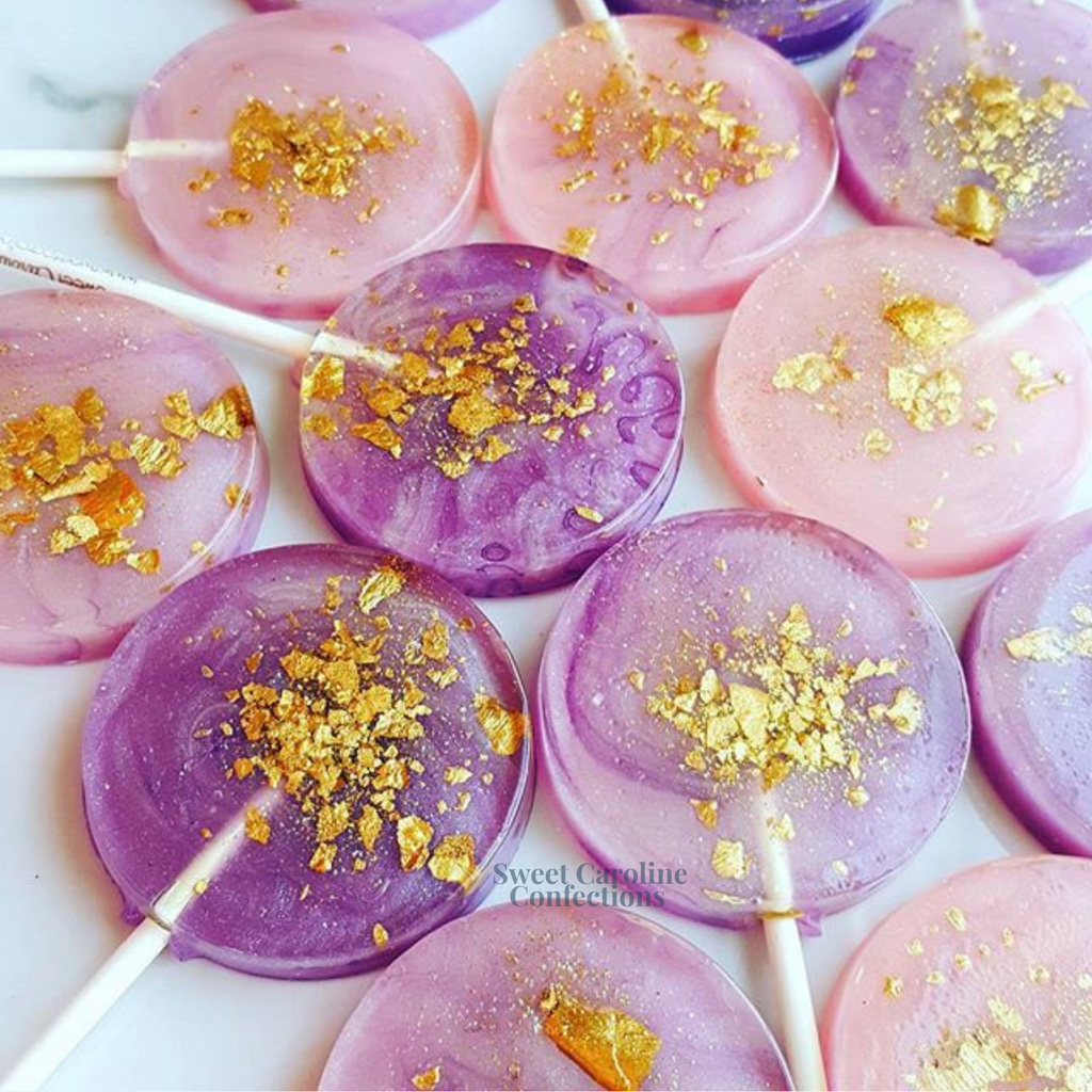 Pink and purple watercolor lollipops with gold flake sparkle
