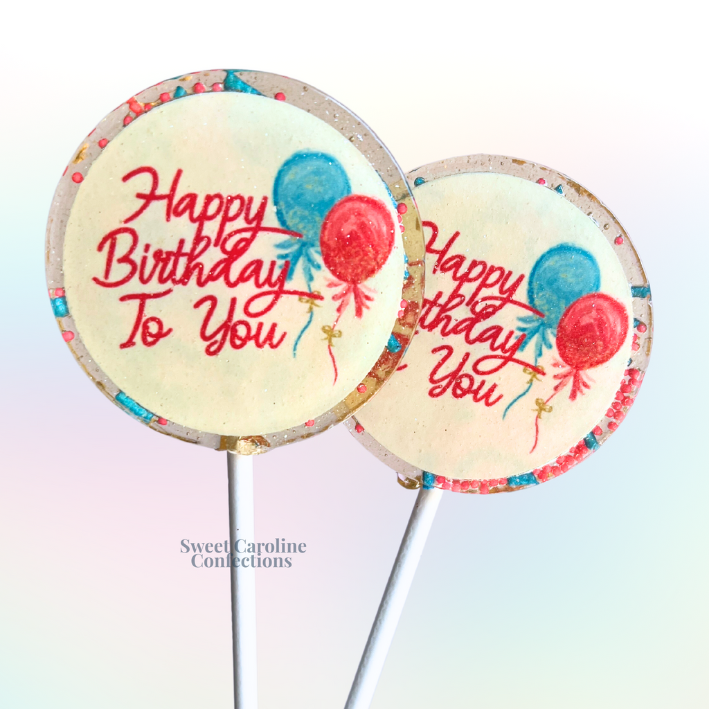 Soft pink and blue lollipops with 
