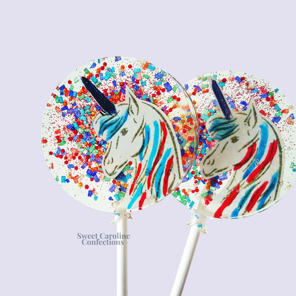 Rainbow Unicorn Lollipops with hand-painted rainbow accents.