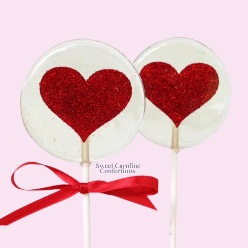 Red heart shaped sparkle lollipops for Valentine's Day
