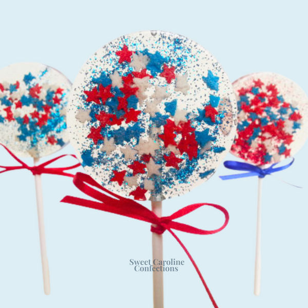 Set of 6 clear round sparkle lollipops featuring red, white, and blue edible mini stars and glitter, perfect for 4th of July celebrations.