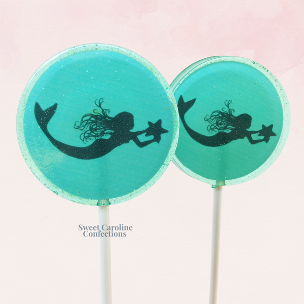 Detail of the teal glitter border and sharp mermaid silhouette.
