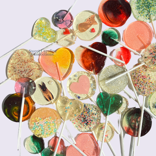 Variety sparkle lollipop pack with mixed designs for birthday party favors, vegan and gluten-free.